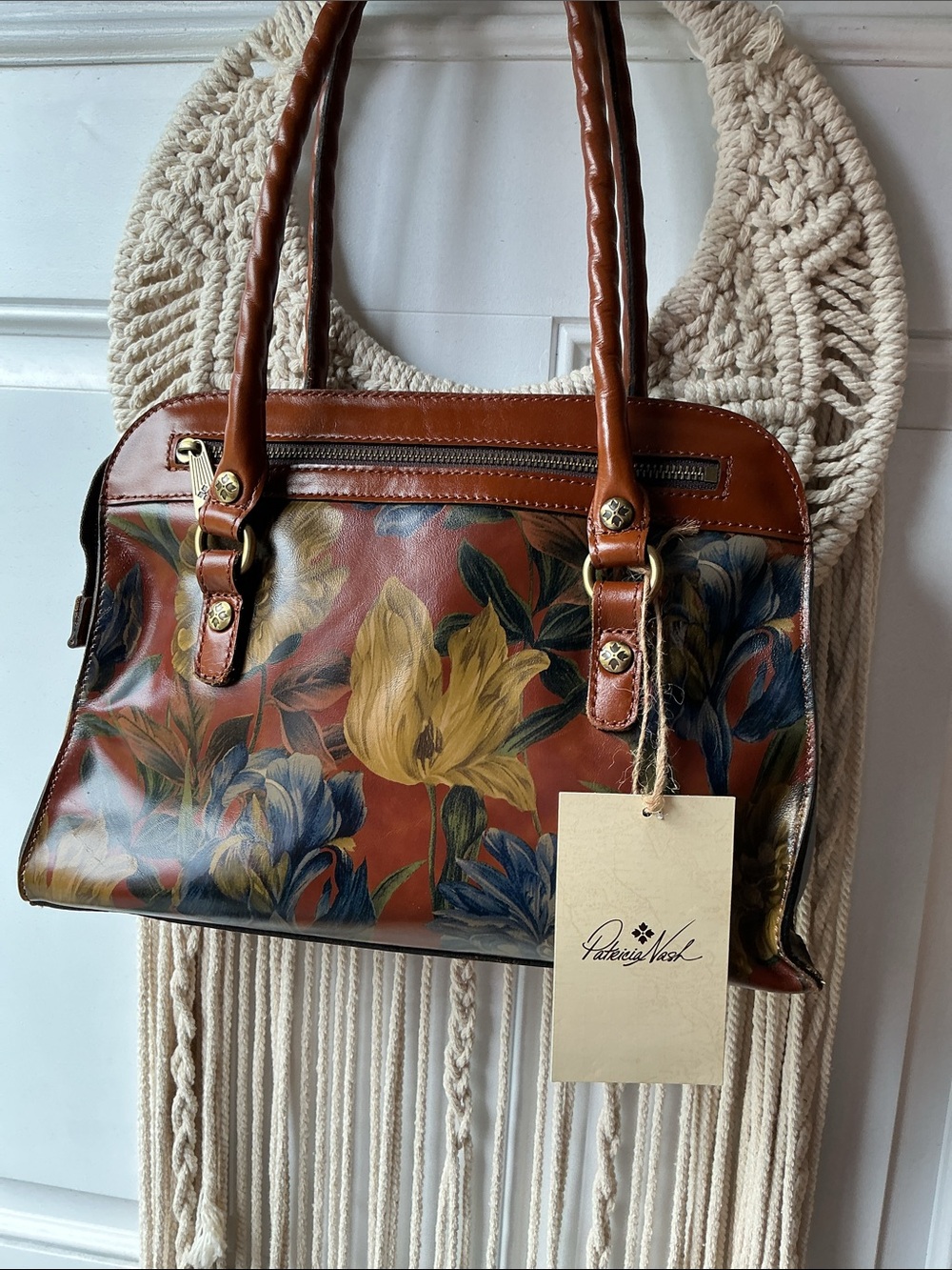 Patricia Nash Calvi handbag features a vibrant floral leather design. NWT.
